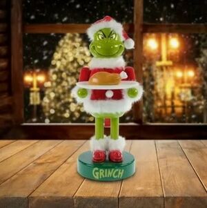 The Grinch Nutcracker Christmas Figurine with Santa Hat